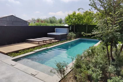 Bigger view of Monobloc zwembad met grijze coating en Spa Serentity 5900