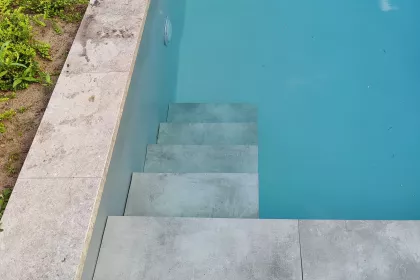 Bigger view of POOL ONE PPC ZWEMBADEN AFGEWERKT MET WATERTERRAS IN TEGELS